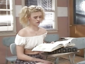A slutty but appealing blonde with pigtails seduces her teacher and sucks his cock.